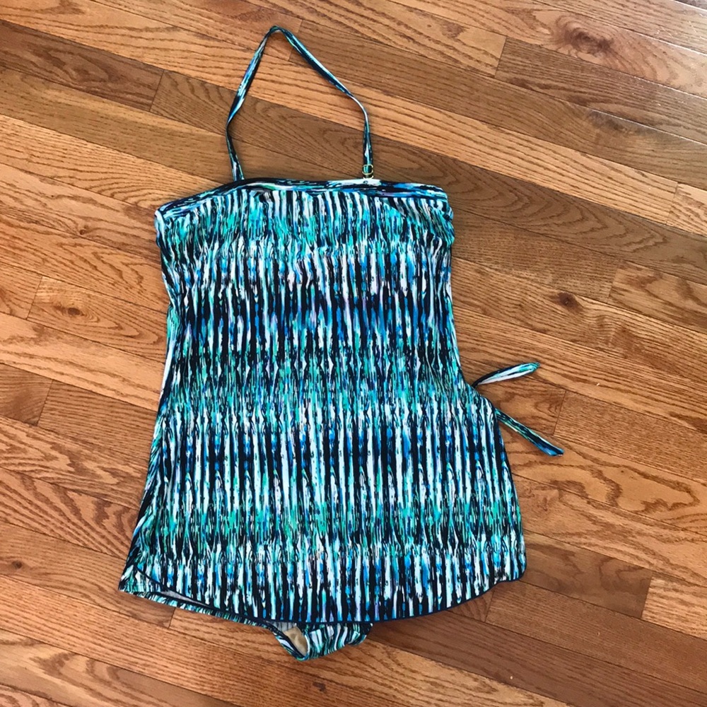 Slimming swimsuit with a skirt in front